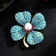 Synthetic Turquoise Four-Leaf Clover Brooch and Freshwater Pearl Brooch