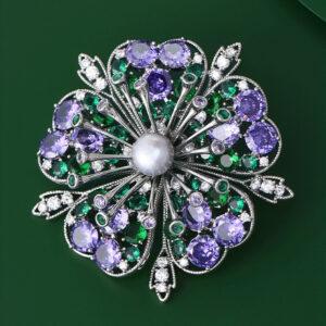 Floral brooch with freshwater pearls and zirconia a perfect accessory for evening gowns.
