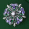Floral brooch with freshwater pearls and zirconia a perfect accessory for evening gowns.