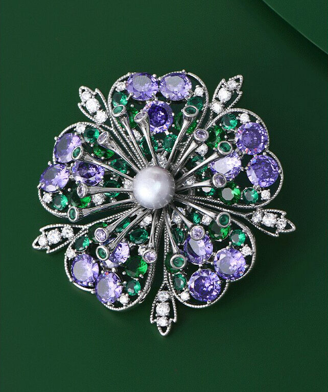 Floral brooch with freshwater pearls and zirconia a perfect accessory for evening gowns.