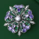 Floral brooch with freshwater pearls and zirconia a perfect accessory for evening gowns.