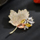Maple Leaf Brooch with Shell and Floral Design